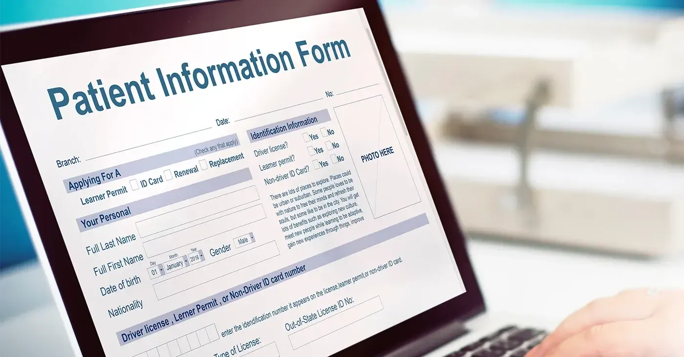 patient information form displaying on laptop