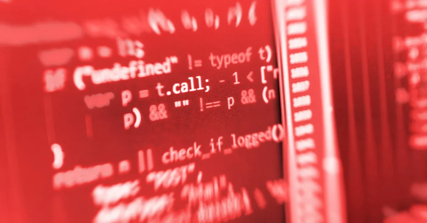 red computer screen displaying code