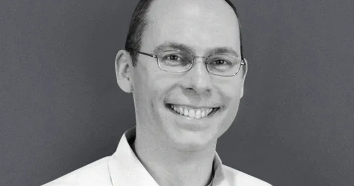 Erik Thoen headshot in black and grey