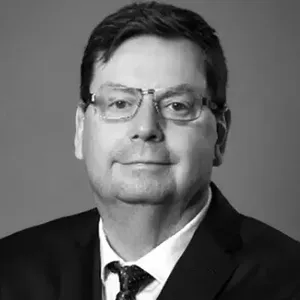 Black and white headshot of man