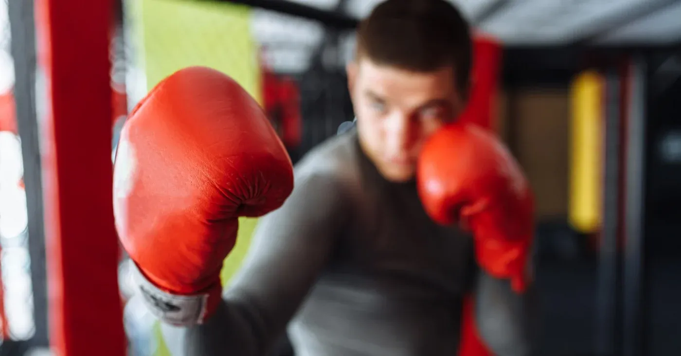 man in boxing gloves squaring up