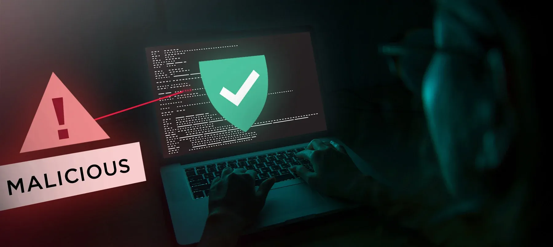 laptop screen with green shield checkmark being labelled as malicious