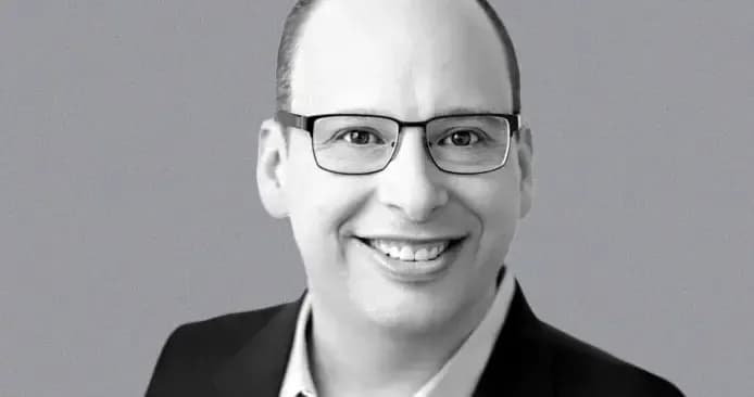 Hugh Thompson headshot in black and grey