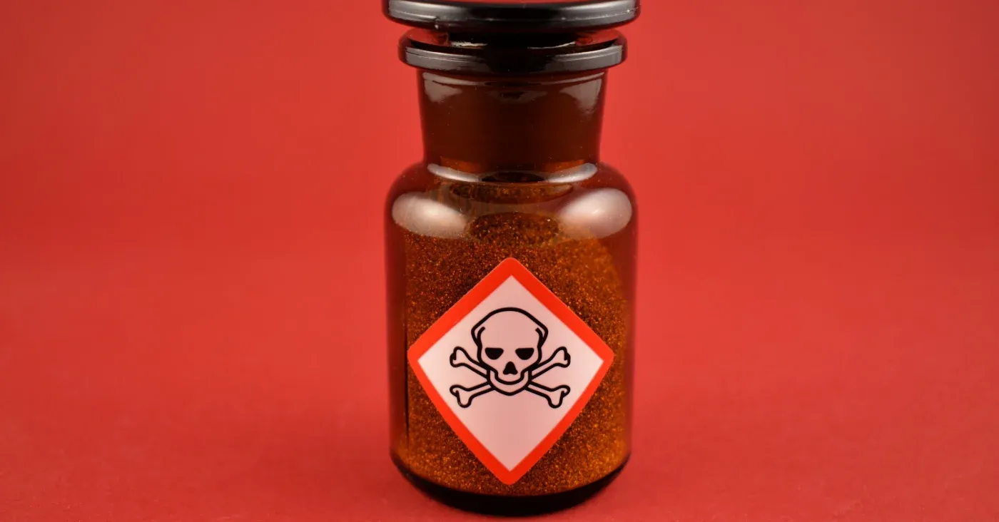 brown glass bottle of poison