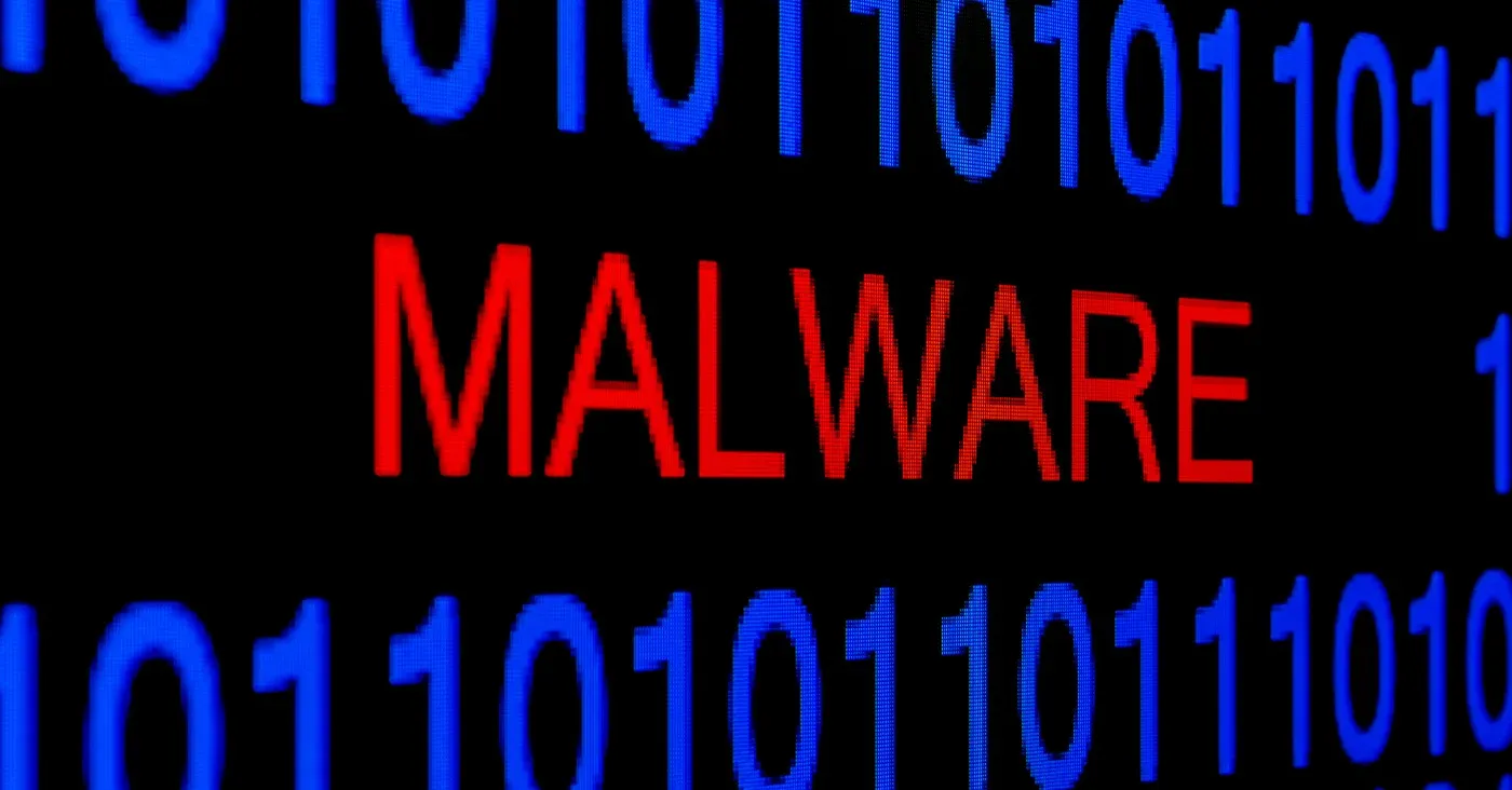 red word malware written between binary code