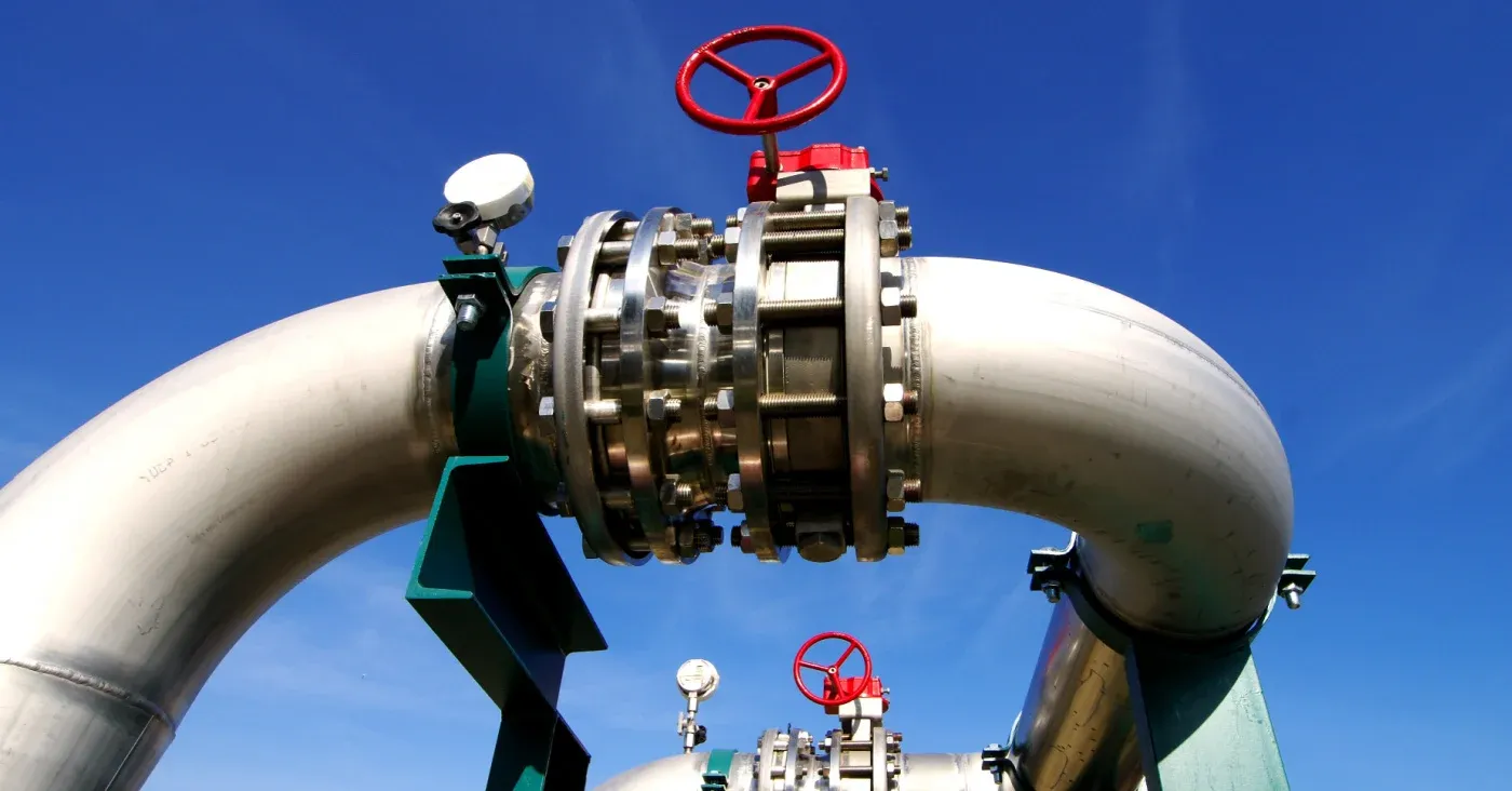pipeline with red shutoff wheel valve