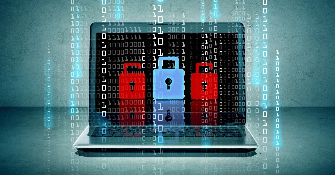 three locks in front of binary code streaming down over open laptop