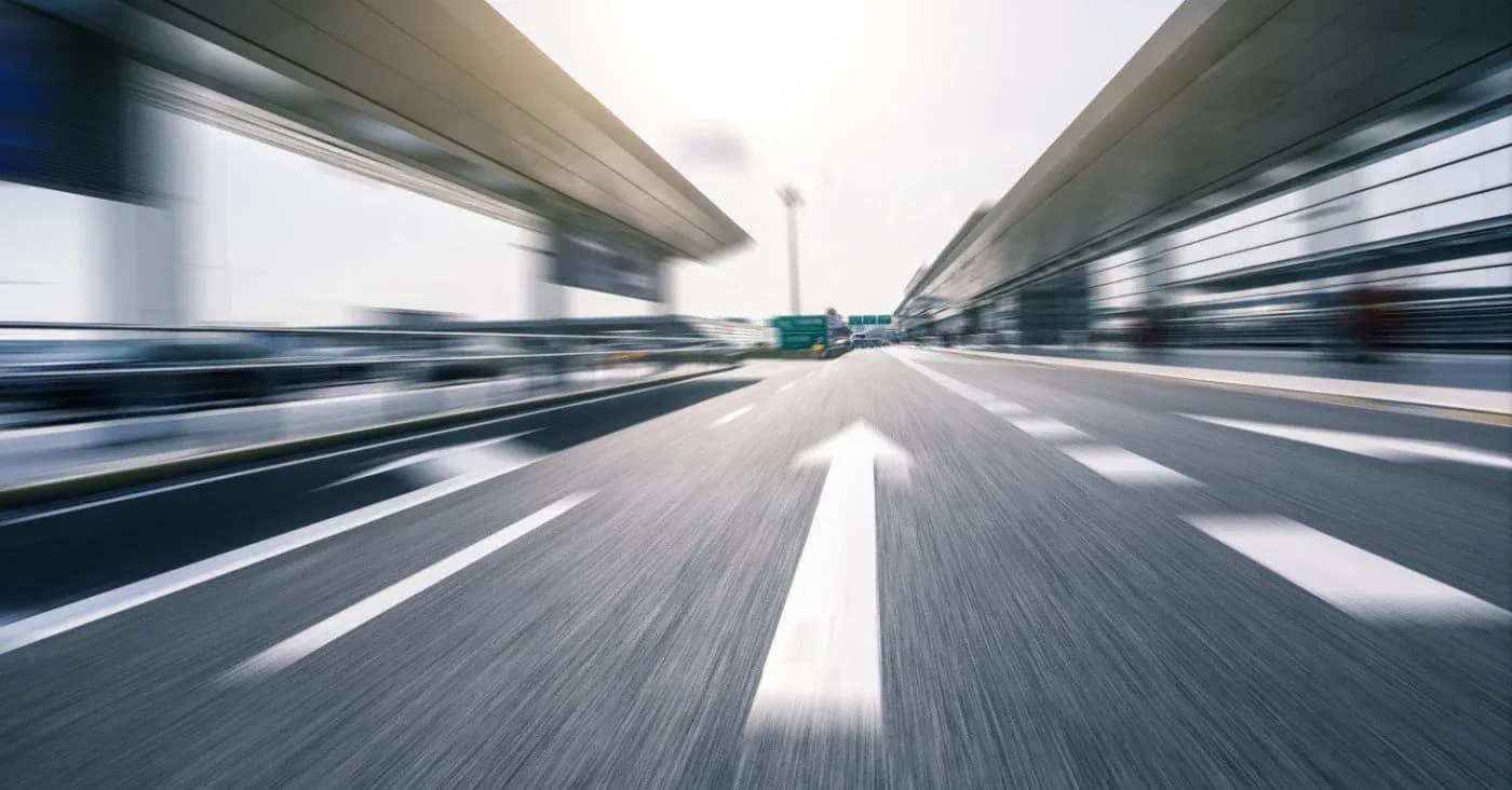 blurry photo rushing down road