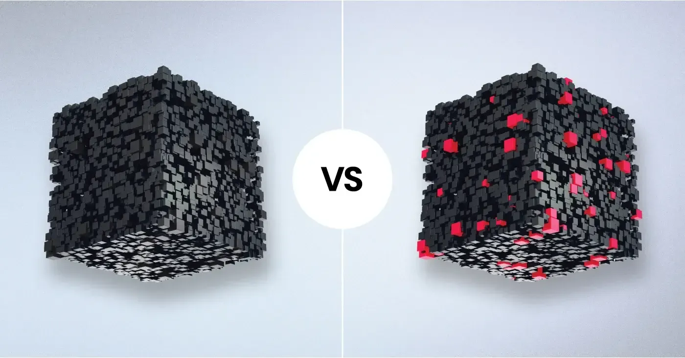 solid black cube versus black cube with red specks