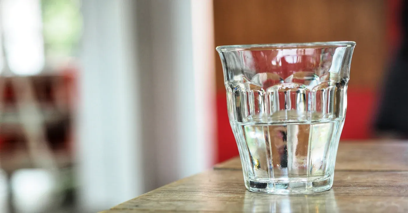 glass of water on table