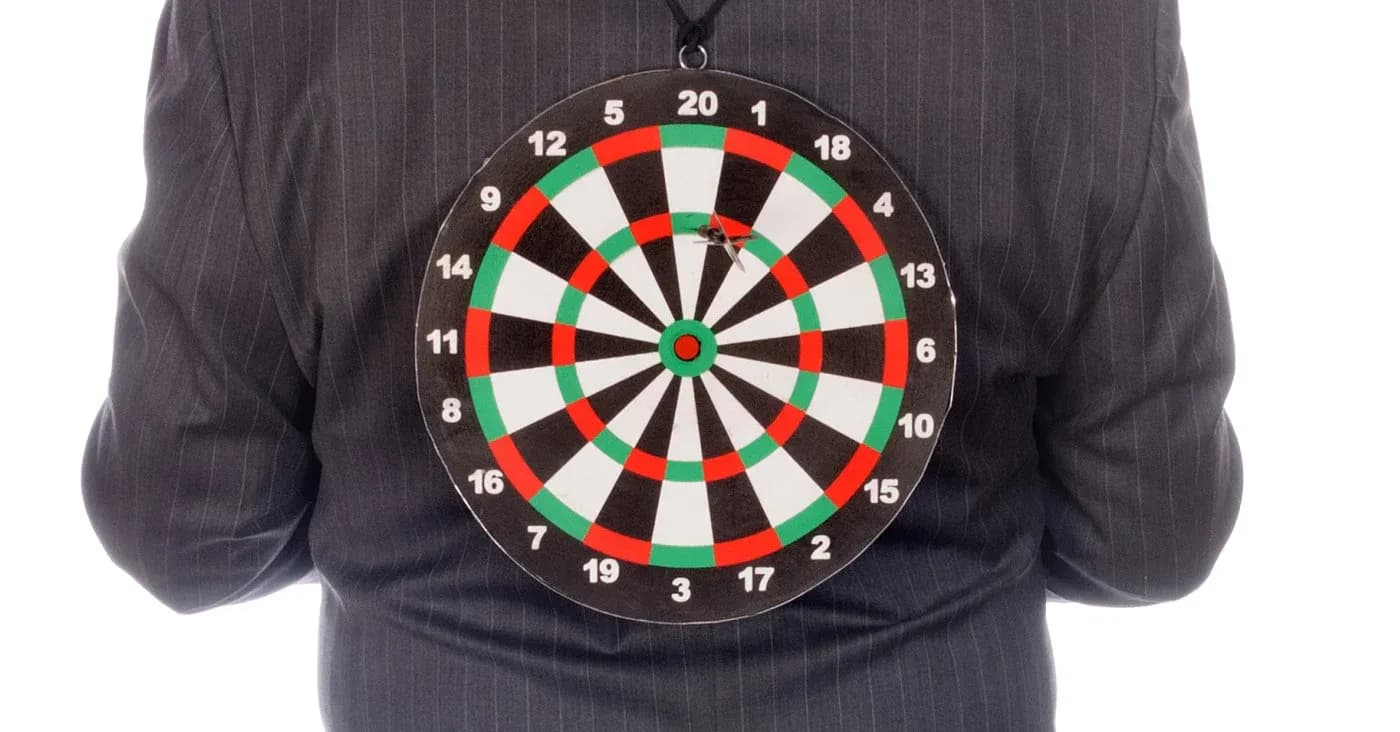 dart board on a person back