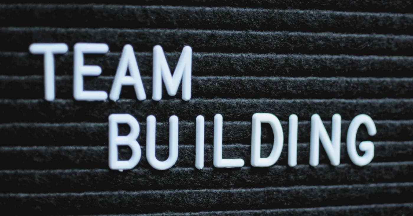 old fashioned analog sign saying team building