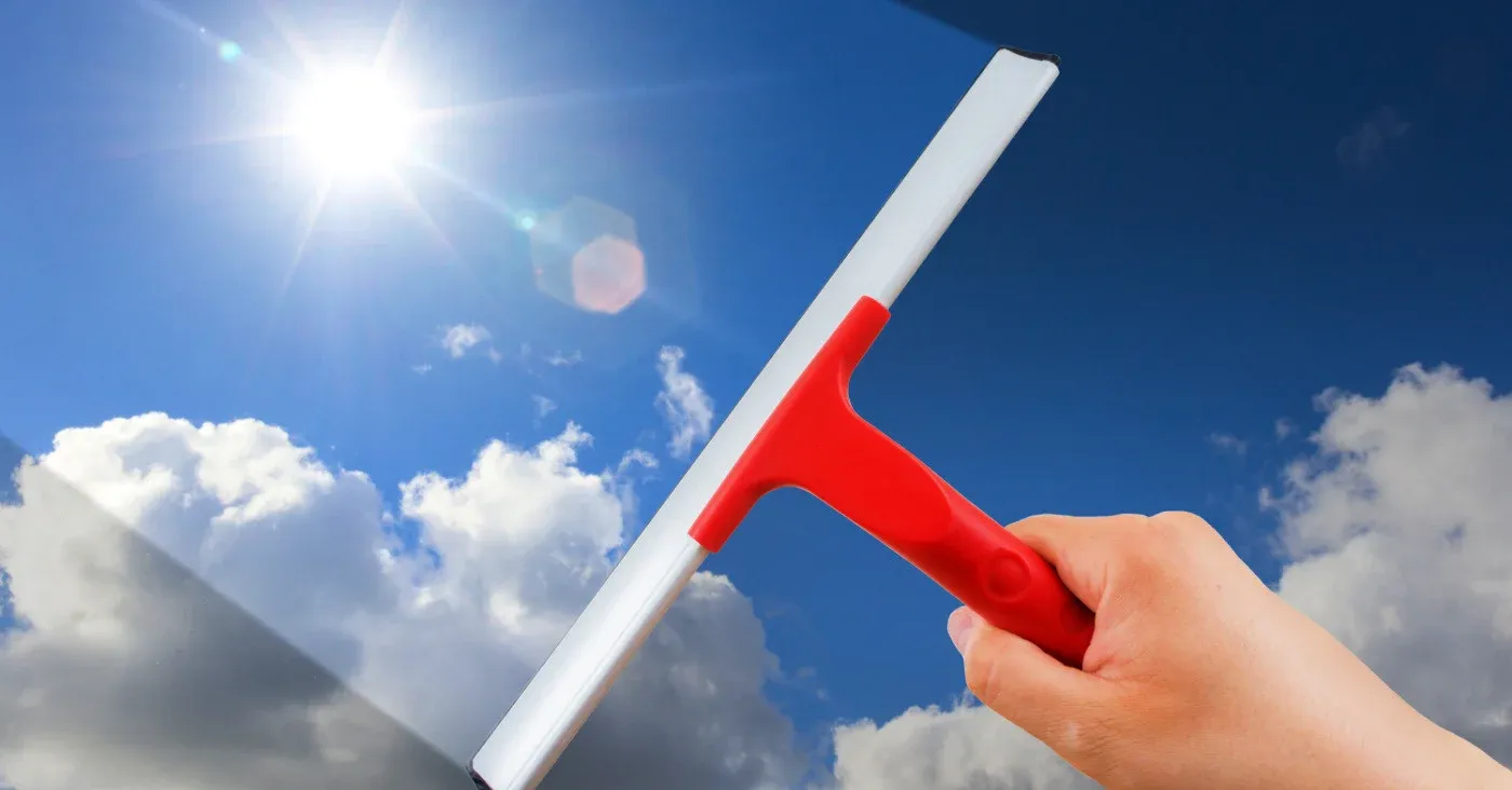 squeegee wiping across sky